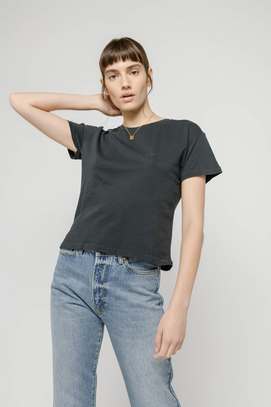 Photo of a model wearing the Cropped Tee in Black
