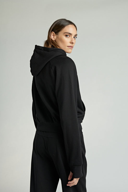 Photo of a model wearing the Cropped Hoodie with Zip in Black